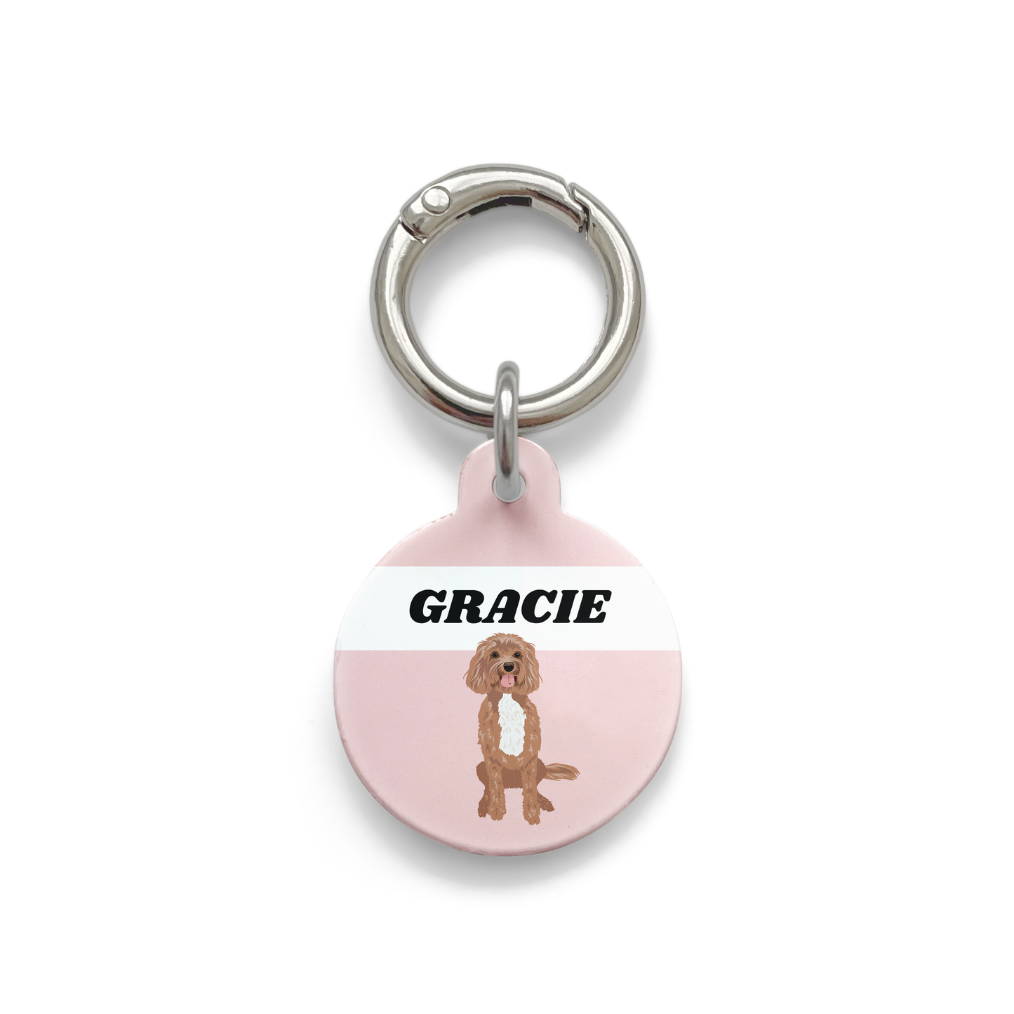 Cavoodle illustration on a circular dog ID tag with a pink background and silver ring.
