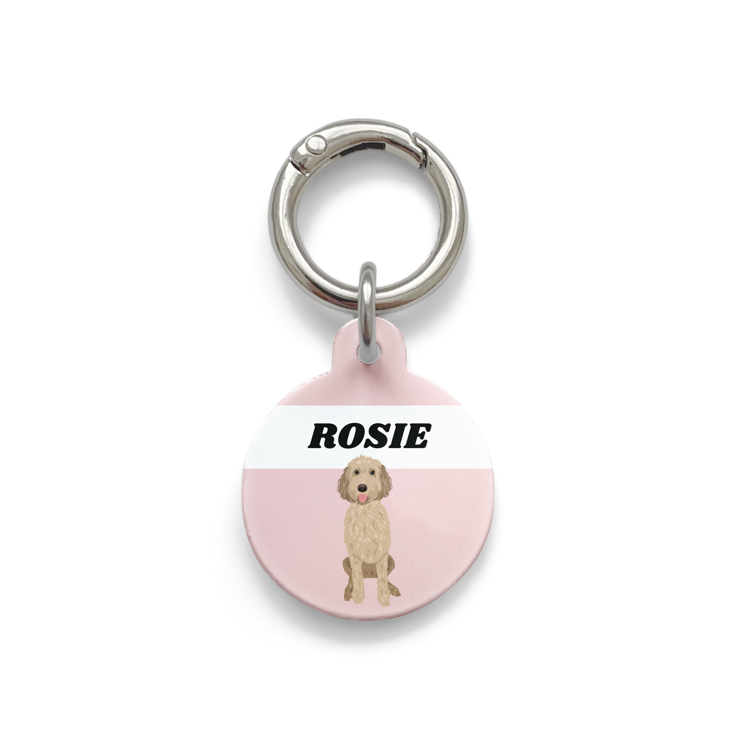 Groodle illustration on a circular dog ID tag with a pink background and silver ring.
