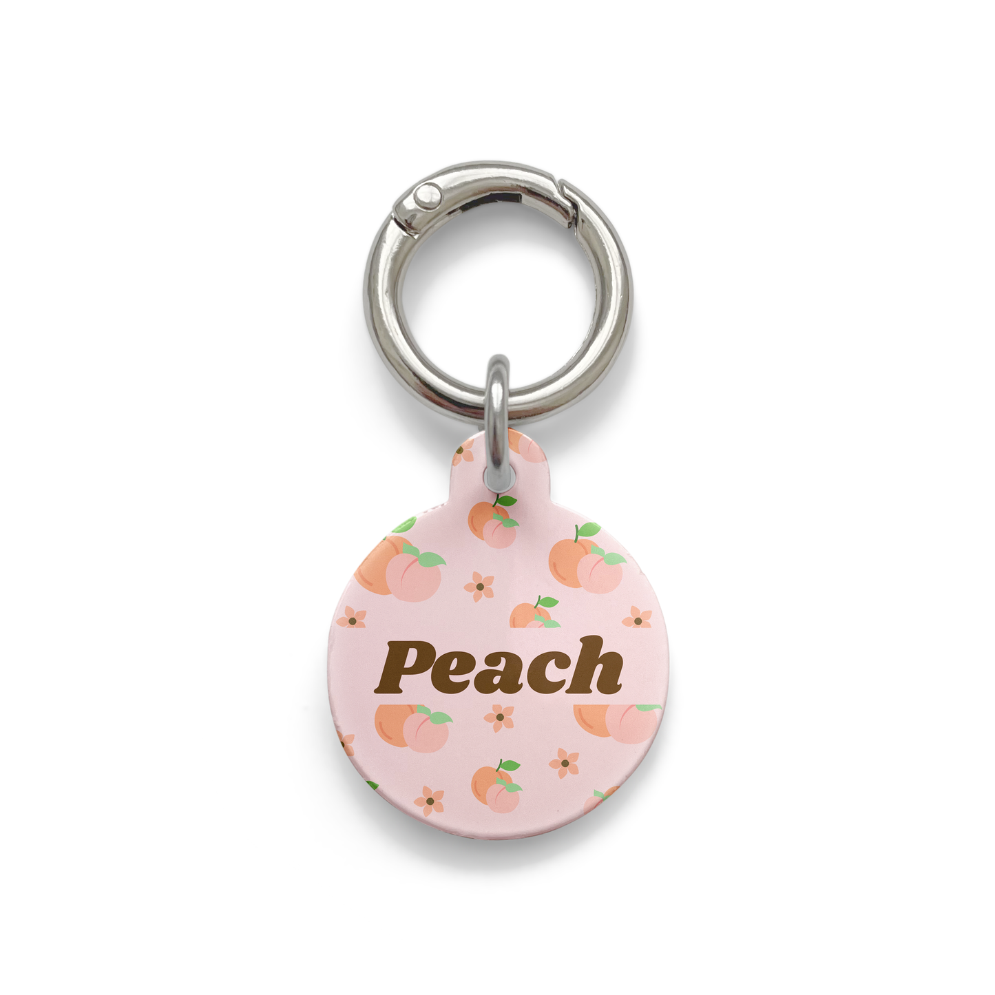 Peach styled Pet ID tag in a circle shape with a silver ring.