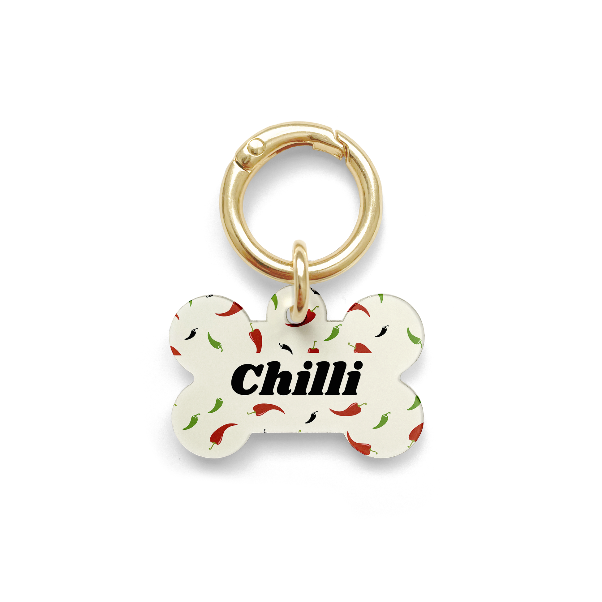 Custom pet ID tag with a design showing green red and black chillies on a bone shaped beige background with gold ring.