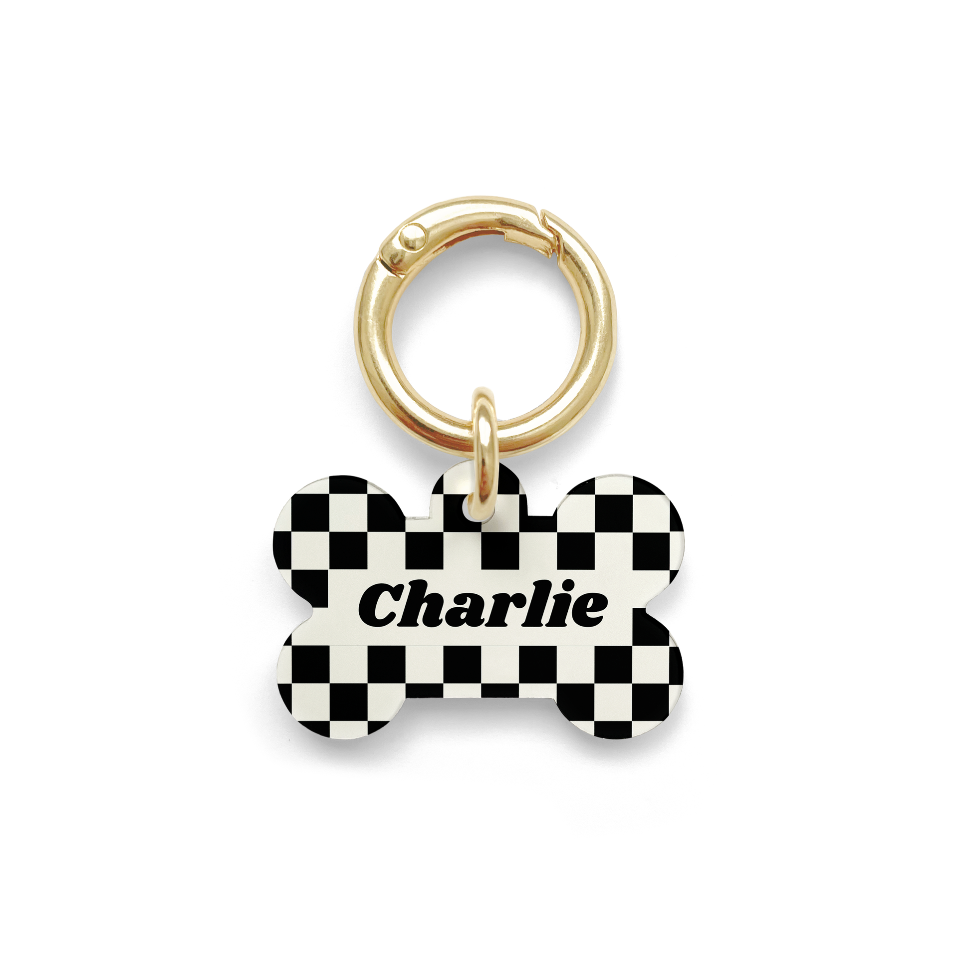 Black and white checker design Pet ID tag in a bone shape with a gold ring.
