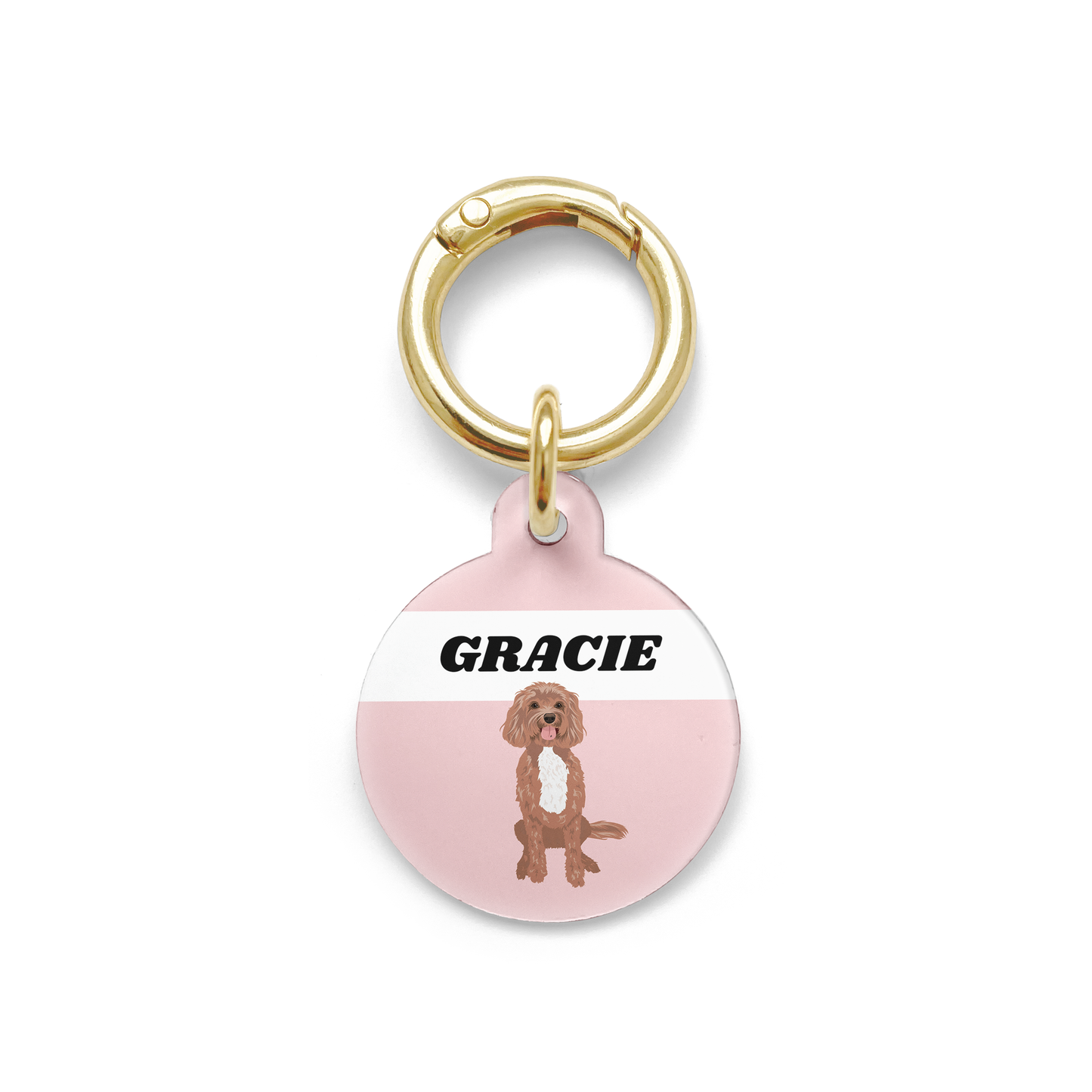 Cavoodle illustration on a circular dog ID tag with a pink background and gold ring.