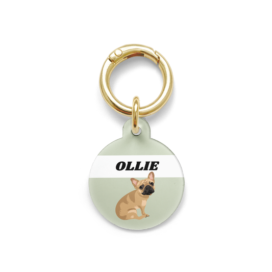 French Bulldog illustration on a circular dog ID tag with a green background and gold ring.