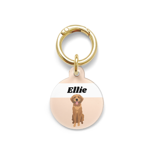 Golden Retriever illustration on a circular dog ID tag with a orange background and gold ring.