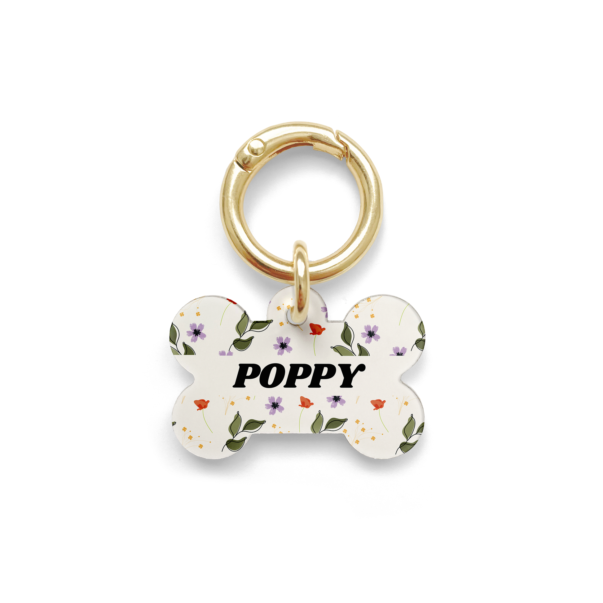 red, purple and green floral patterned pet ID tag in the shape of a bone with a gold ring