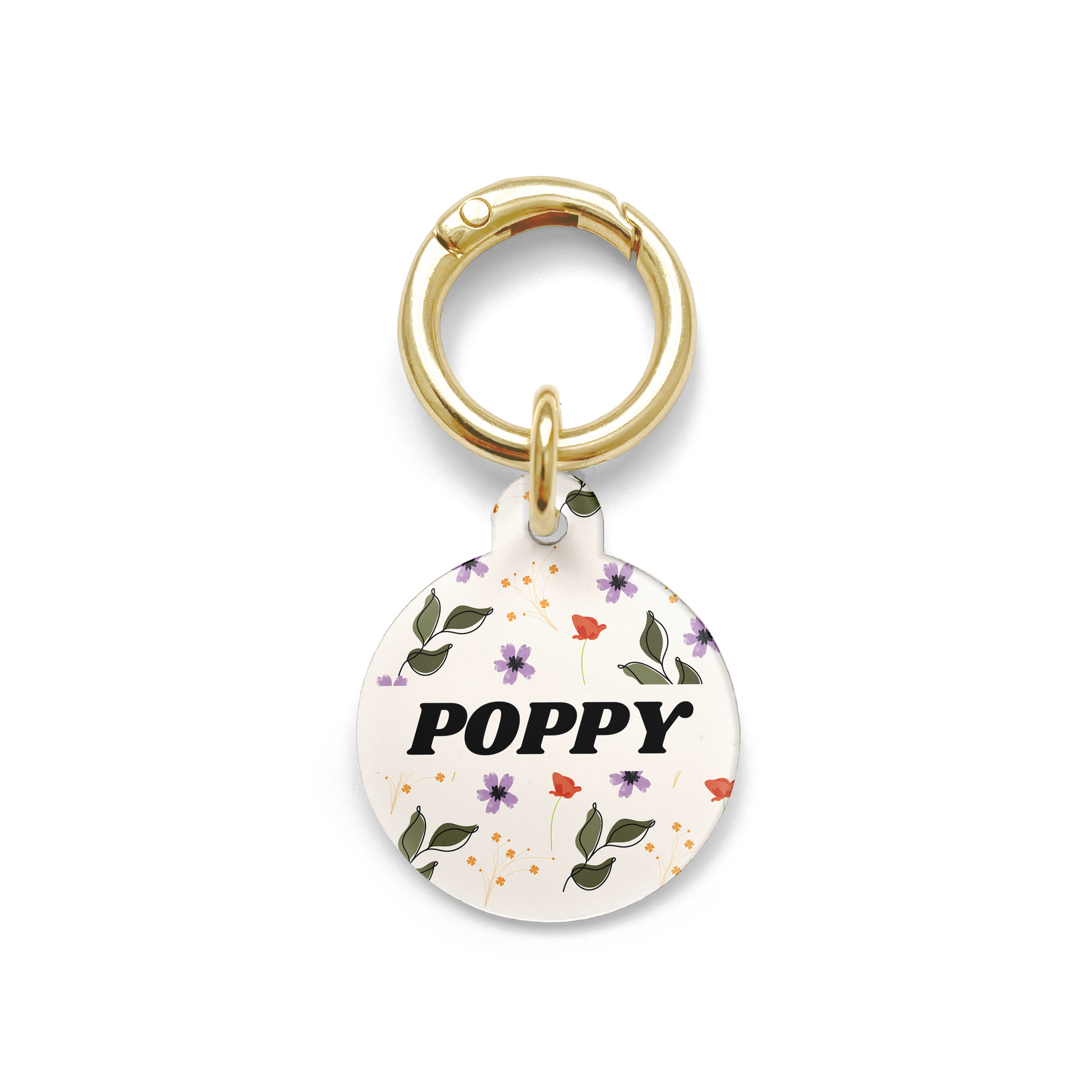 red, purple and green floral patterned pet ID tag in a circular shape with a gold ring
