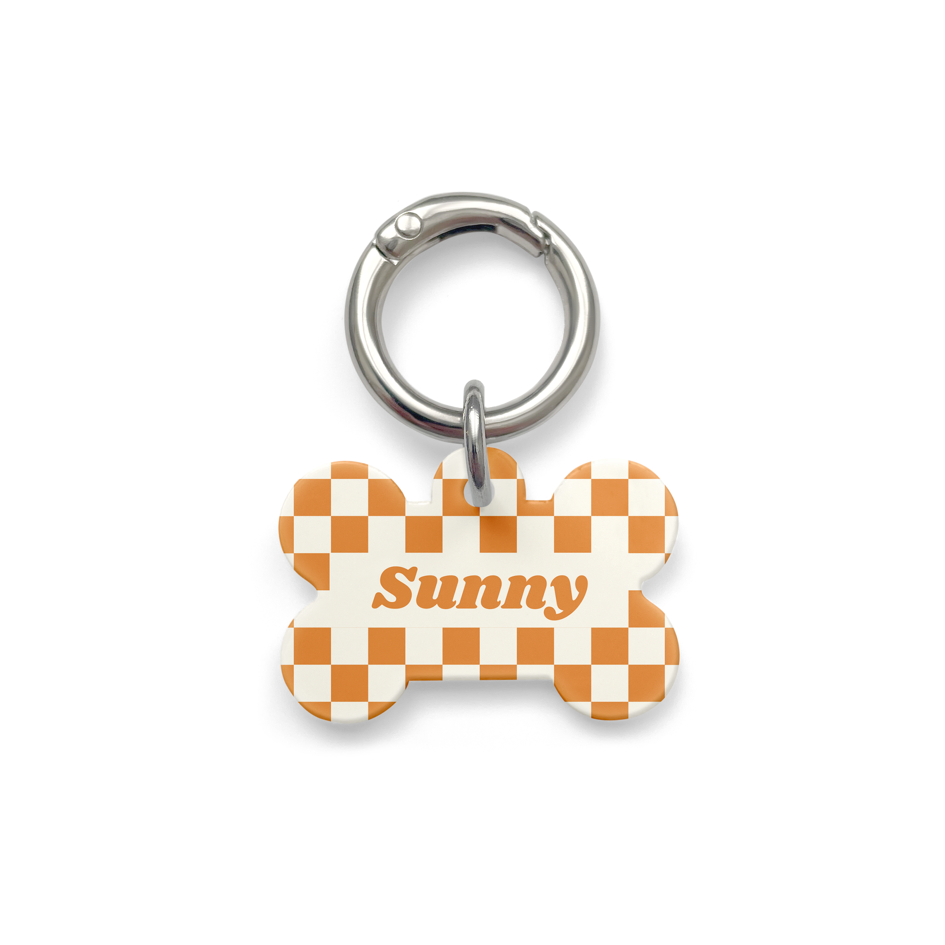Orange and white checker styled Pet ID tag in a bone shape with a silver ring. 