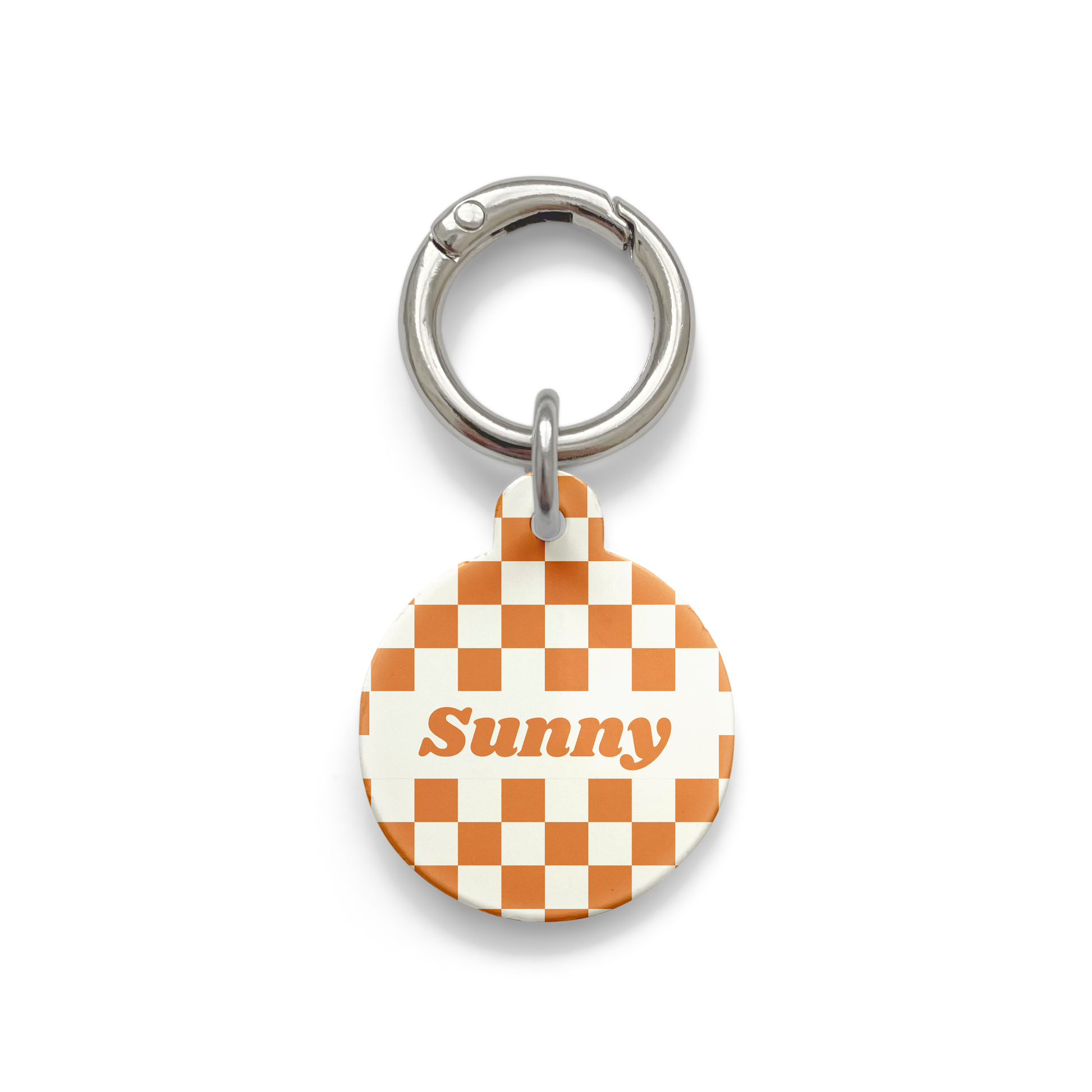 Orange and white checker styled Pet ID tag in a circular shape with a silver ring. 