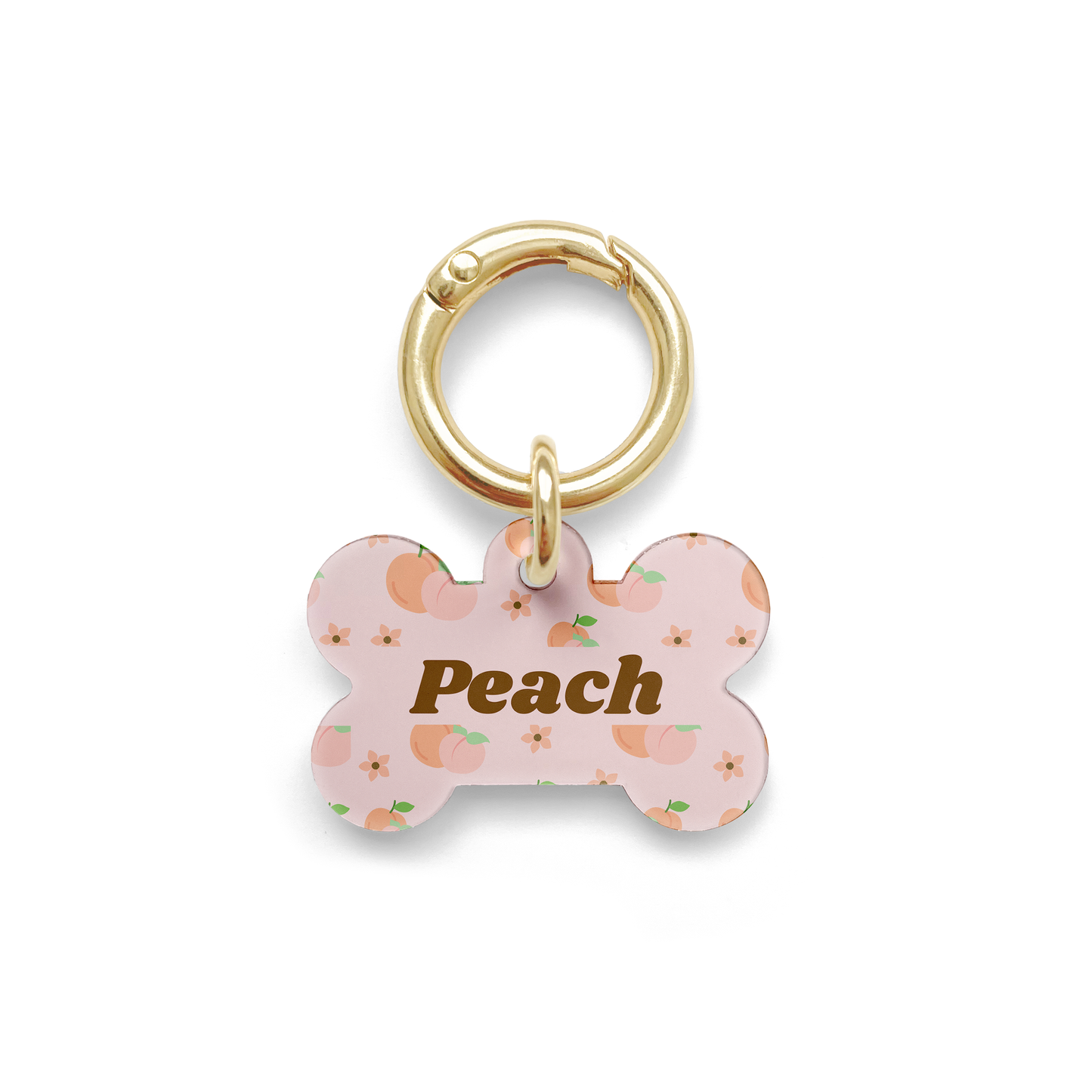 Peach styled Pet ID tag in a bone shape with a gold ring. 
