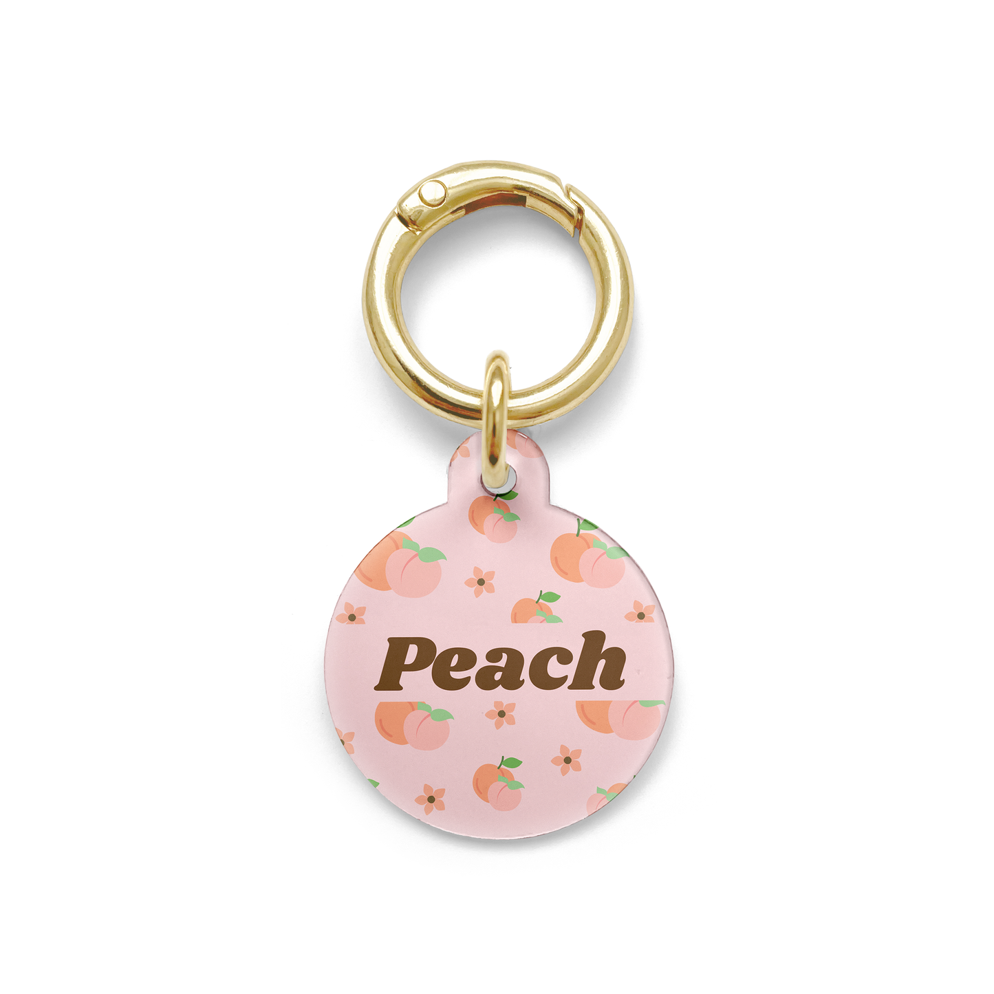 Peach styled Pet ID tag in a circle shape with a gold ring. 