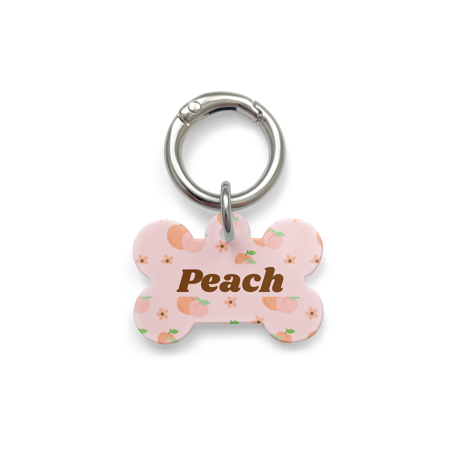 Peach styled Pet ID tag in a bone shape with a silver ring. 