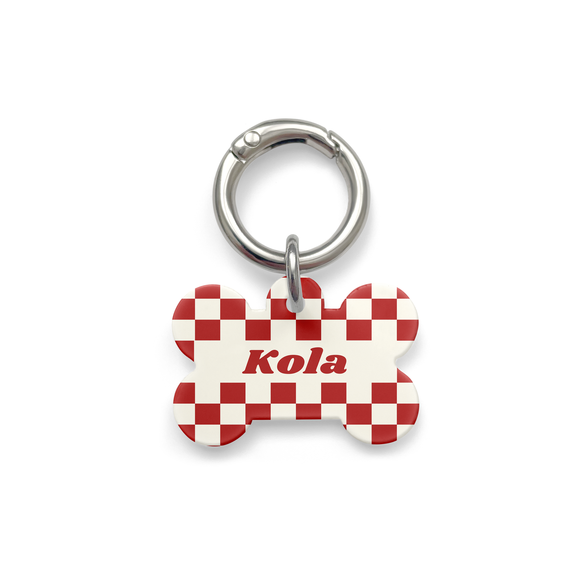 Red and white checker pattern on a Pet ID tag in a bone shape with a silver ring.