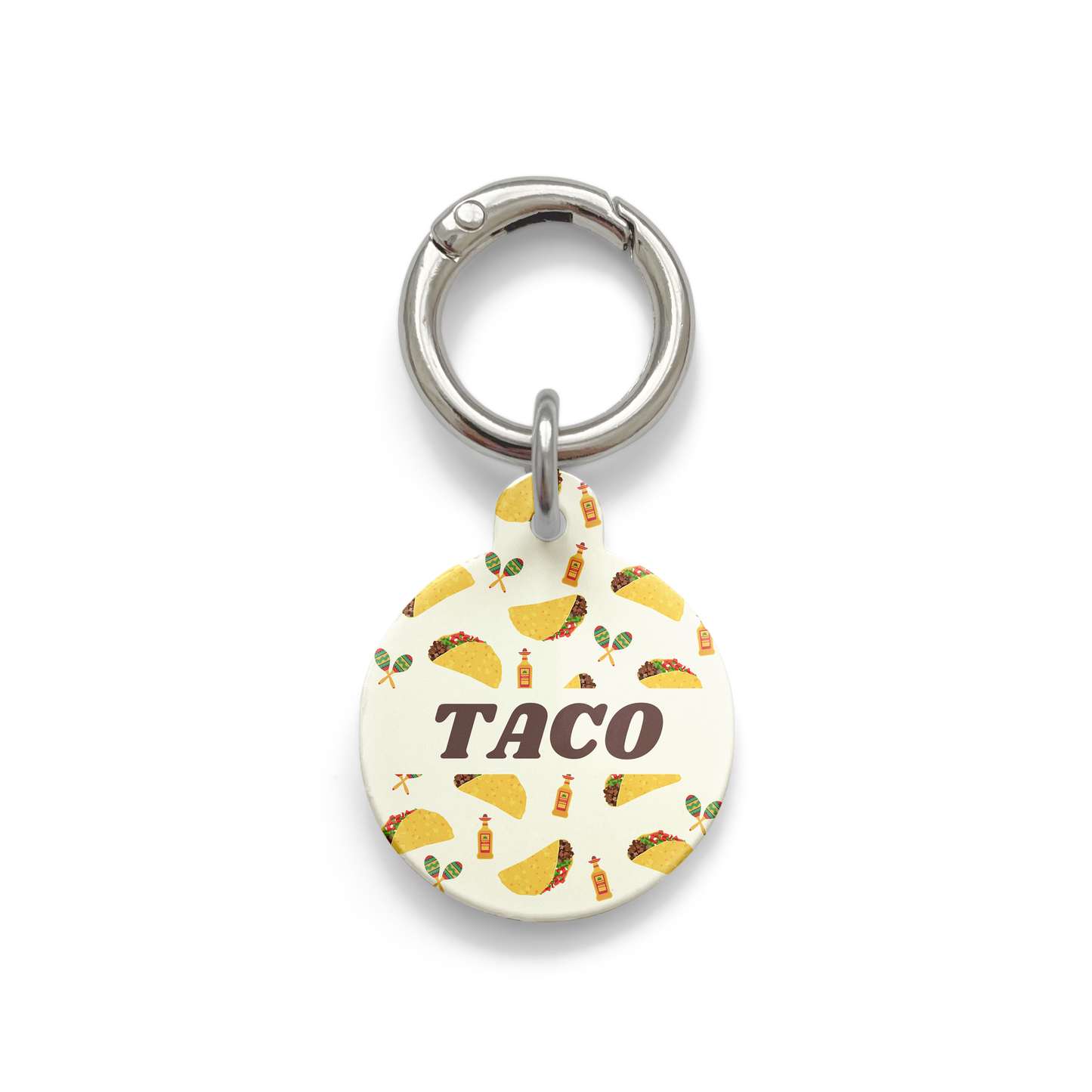 Circle shaped pet ID tag with a design showing tacos, tequila and  maraca's with silver ring.